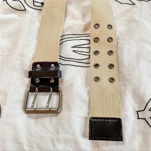 White vintage belt with metal buckle